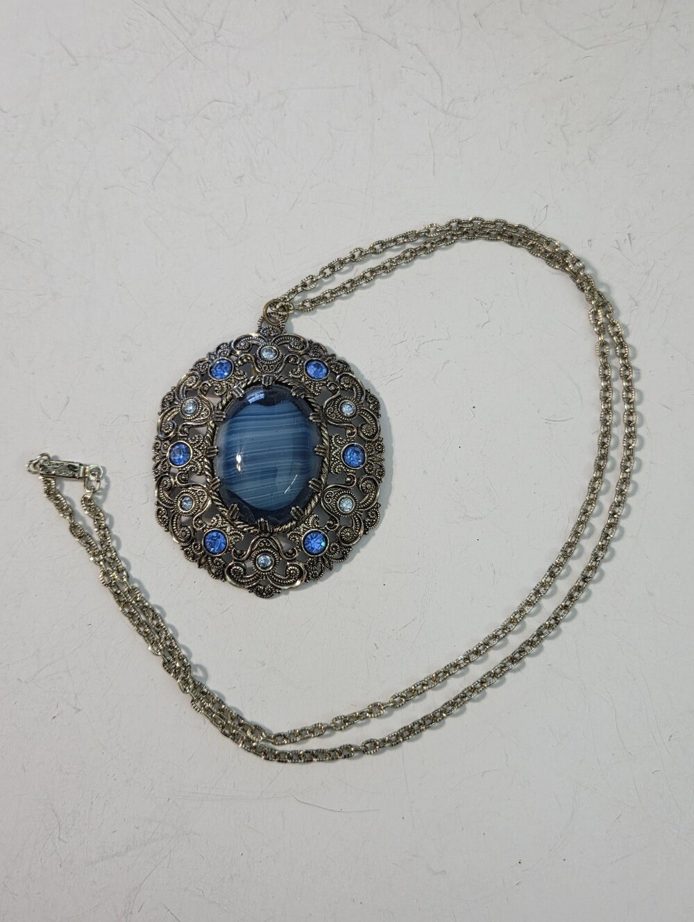 w. germany large blue glass stone ornate pendant filigree necklace flaw goldtone